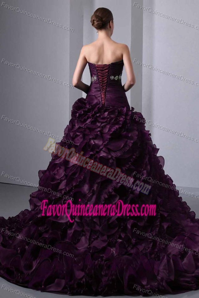 Strapless Princess Sweep Train Quince Dresses with Ruffles in Dark Purple
