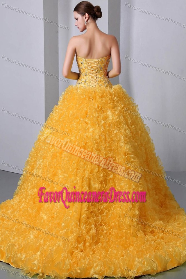 Beautiful Ruffled 2010 Fall Quinceanera Dress with Beadings in Gold Color