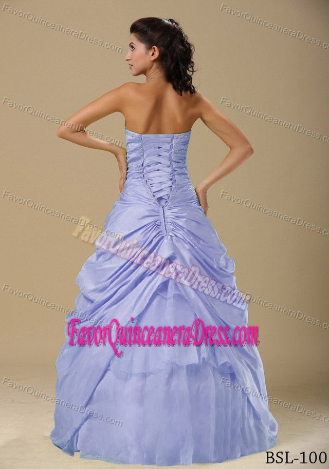 Light Purple Flowery and Ruched Bodice Quinceanera Gown with Ruffles