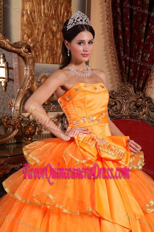 New Orange Ball Gown Quinceanera Dress with Ruffled Layer and Bowknot