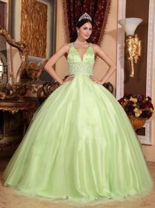 Latest V-neck Yellow Green Tulle Dress for Quinceaneras with Crisscross
